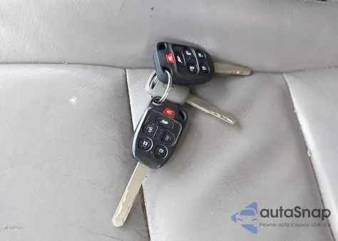 2012 Honda Odyssey Touring/Touring Elite z USA, uszkodzony, nr VIN 5FNRL5H90CB083157